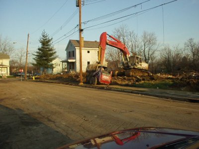 This is the only house left on this side, the guy in the little bulldozer was stuck, the guy in the big one nudged him loose.