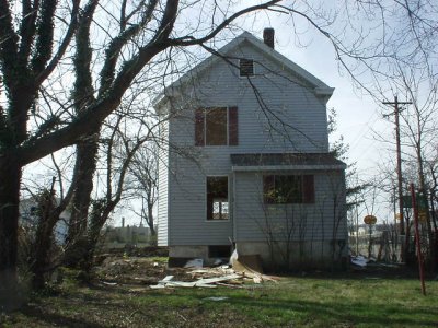 The back of the one on the corner, the clothesline is still there.