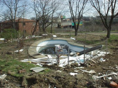 The swimming pool that will be torn up and carted off to the concrete landfill.