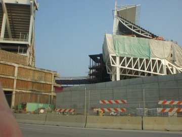 The new stadium is built right into the old. They are 24 inches apart.