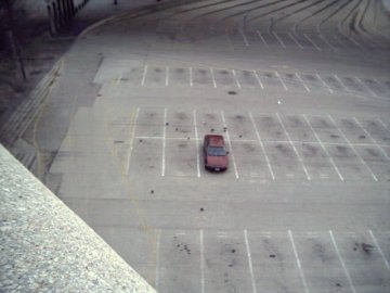 My car sitting on the flood wall